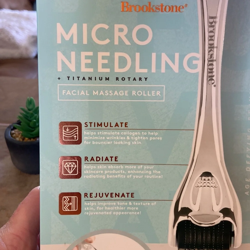 Brookstone Micro Needling Facial Massage Roller in White and Black